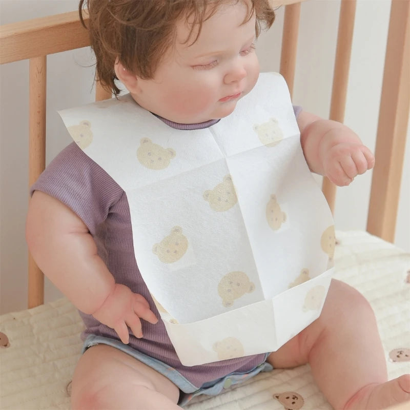 50-Pack Disposable Baby Bibs – Waterproof Cartoon Bear Feeding Bibs for 6M–2Y