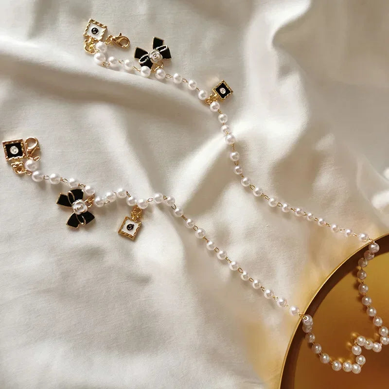Black & White Bow Pearl Glasses Chain Lanyard – Sunglasses Accessory for Women