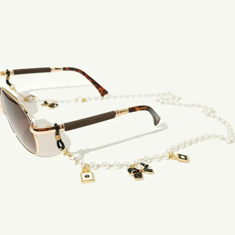 Black & White Bow Pearl Glasses Chain Lanyard – Sunglasses Accessory for Women